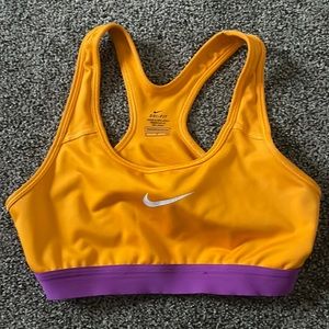 Nike sports bra. Orange and purple. Barely worn. Size small
